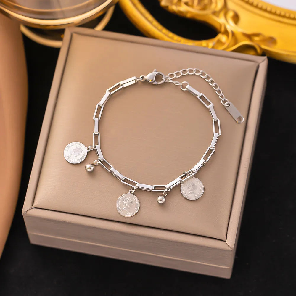 Silver-Bond Coins Bracelet